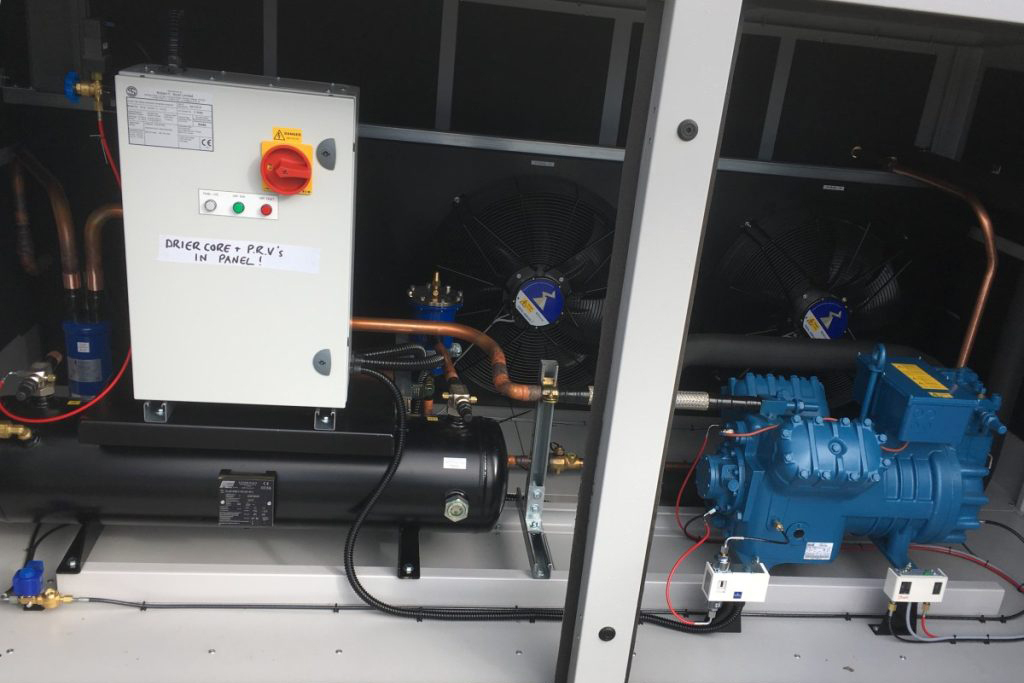 Commercial Refrigeration Engineer inspecting cooling equipment